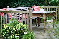 The wooden verandah and seating area - Sallowfield Cottage B&B, Norfolk