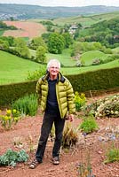Ray Brown, plant breeder and seed supplier pictured in his trials field. Plantworld,  Devon, UK