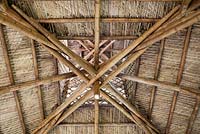 The Bamboo Pavilion is constructed with nearly 350 stems of Guadua angustifolia smoked bamboo and over 9,000 Sabal Palm fronds for the thatched roof made by the Seminole indians - McKee Botanical Garden, Vero Beach, Florida