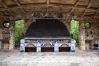 The Spanish Kitchen adorned with Spanish tiles and wrought iron details is a replica of a Mexican fiesta kitchen - McKee Botanical Garden, Vero Beach, Florida