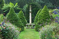 Sundial Garden - Conical Piceas, Salvia, Verbena bonariensis, Dahlia, Fuchsia and Dicksonia antarctica - Exbury Gardens, Hampshire 
