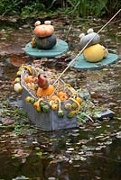 Fishing figures made of pumpkins