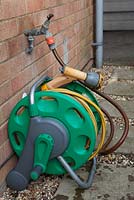 Hosepipe reel connected to external tap