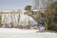 View from the field towards Glebe Cottage on a snowy winter's day