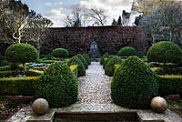 The parterre with clipped box faces the pond - The Little House