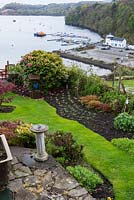 Coastal garden with panoramic views over the bay at Tobermory, Isle of Mull,