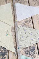Step by step of making garden bunting - Pin the triangles inside the webbing