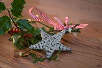 Handmade Christmas decorations with holly and ivy