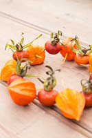 Decorative wreath made of Rose hips and Physalis