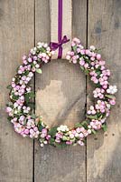 Decorative pink Snowberry wreath