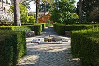 A fountain in The Ladies Garden at the Real Alcazar, Seville, Andalusia, Spain