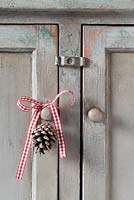 Step by step of making Christmas Doorknob Decorations - Attach to a doorknob by tying a simple bow