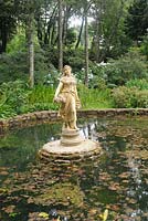 Garden feature pond with a statue 