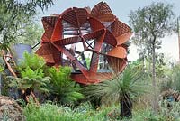 Trailfinders Australian Garden, Chelsea Flower Show 2013. Modern garden studio building with Tree Ferns