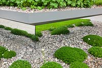 Split level gravel garden with mirrored panels in The First Touch Garden, RHS Chelsea Flower Show 2013
