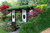An Alcove - Tokonoma Garden, Entrance to the japanese garden with living roof cover and sedum living wall