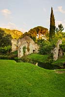 Ninfa garden, Giardini di Ninfa, Italy - Ruin and river