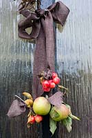 Simple Autumn front door decoration with apples