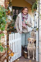 Garden owner Simone Bay and her Labrador Josy
