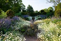 Cothay Manor, Greenham, Somerset. Herbaceous borders with gravel path
