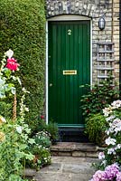 Front door with hawtorn and Abutilon