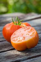 Tomato 'Believe it or Not' sliced open. Heirloom beef tomato