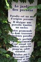 Explanations, descriptions and directions displayed throughout the garden. Jardin des Paradis, Cordes-sur-Ciel, Tarn, France.