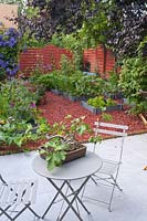 Terrace with flowery vegetable garden