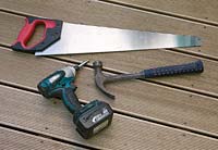 Decking project - saw, hammer and drill used to make a deck