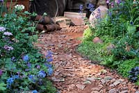 Path made with old broken terracotta pieces - The Potter's Garden, designer 'Nature Redesigned'