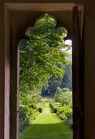 View out of the front door of the red house. Painswick Rococo Garden, Gloucestershire 