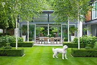 Lawn, glass pavilion, Betula utilis 'jacquemontii' and outdoor dining table - The Glass House, Petersham - Architects Terry Farrell Partners - Garden design by Sallis Chandler 