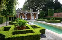 Italianate formal garden with box parterre, loggia and swimming pool. Seend, Wiltshire