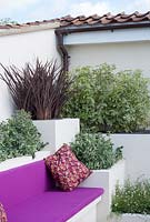 Outdoor seating area with box planters - Rooftop Relaxation garden - Bath and West Garden Show 2009