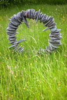 Stone sculpture in the meadow