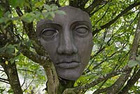 Face sculpture at Sculptureheaven sculpture garden, Rhydlewis, Llandysul, Wales, UK.