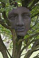 Face sculpture at Sculptureheaven sculpture garden, Rhydlewis, Llandysul, Wales, UK.