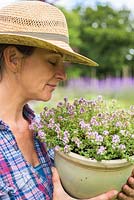 Woman smelling Thyme