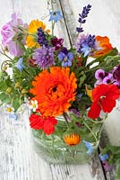 Edible flowers in glass jar - inc calendula, nasturiums, borage, chives, lavandula and violas
