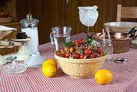 Ingredients to make rosehip jam are rosehips, lemons, sugar and water.
