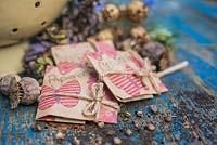 Seed packet gifts containing Papaver, Cerinthe and Nigella seeds. 