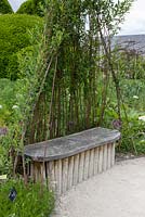 Wooden garden seat with willow arbour, Le Potager du Domaine, Estate Vegetable Garden, Festival des Jardins International 2014, Chaumont sur Loire