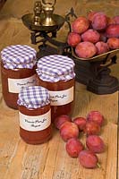 Jam making with Victoria Plums showing freshly gathered fruit and home made jam