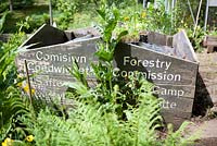 Re-using signs for a compost bin