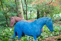 Swaying Horses by Alison Berman made from fibreglass and resin. The Hannah Peschar Sculpture Garden designed by Anthony Paul, Landscape Designer