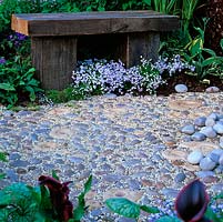 Path created from pebbles and ammonites cast in reconstituted stone, set in small pebbles.