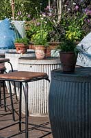 Garden table made from galvanized drums.