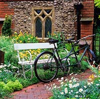 Inspired by old Music Hall song Daisy Daisy about a bicycle made for two, this is a corner of a typical English country churchyard.