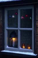 Window at Christmas with antique and vintage decorations