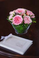 Pink roses in an arrangement for a wedding. Cut flower rose variety from David Austin Roses